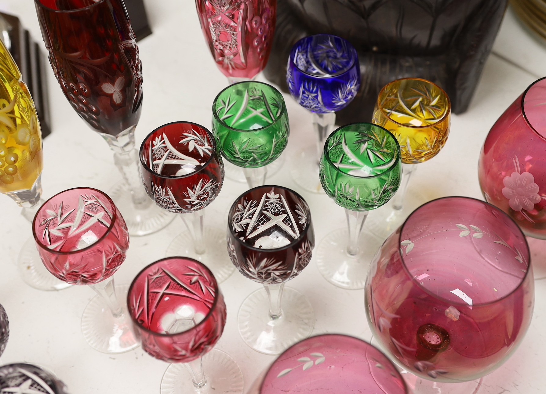 A group of mixed coloured bowl wine glasses